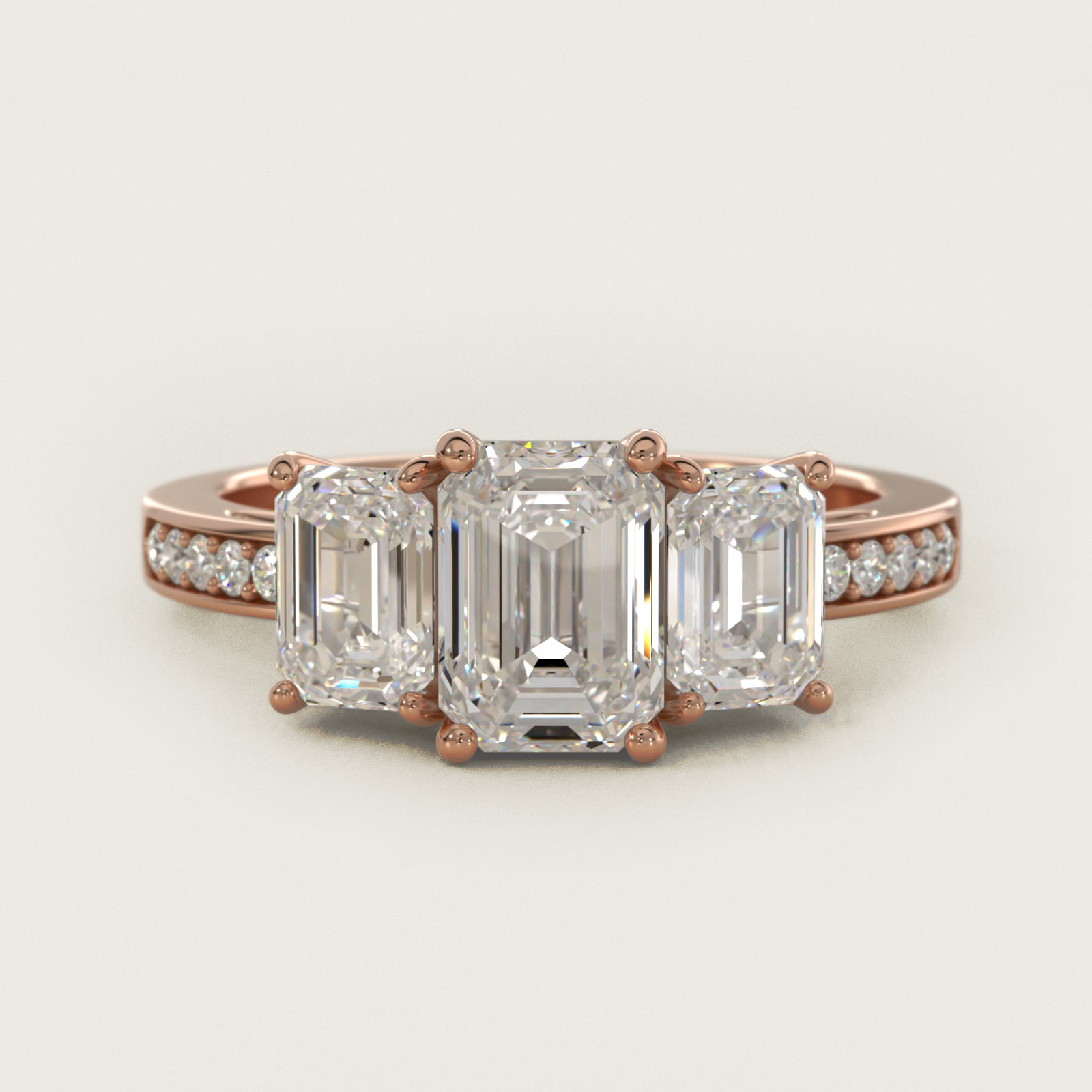 Emerald Cut Diamond Three Stone Engagement Ring With Pavé Set Diamonds In 14K Rose Gold By James Allen