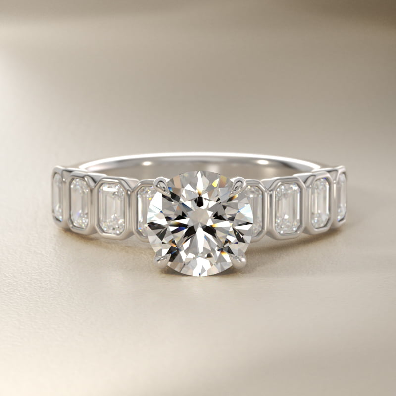 Bezel Set Emerald Cut Side Stone Diamond Engagement Ring In 14K White Gold