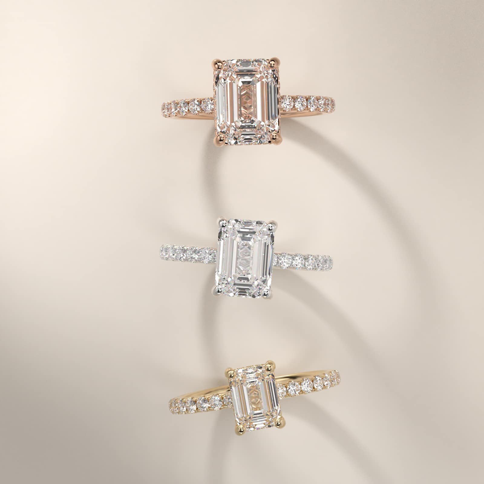 Emerald cut diamond engagement ring yellow gold pavé packshot close-up box
