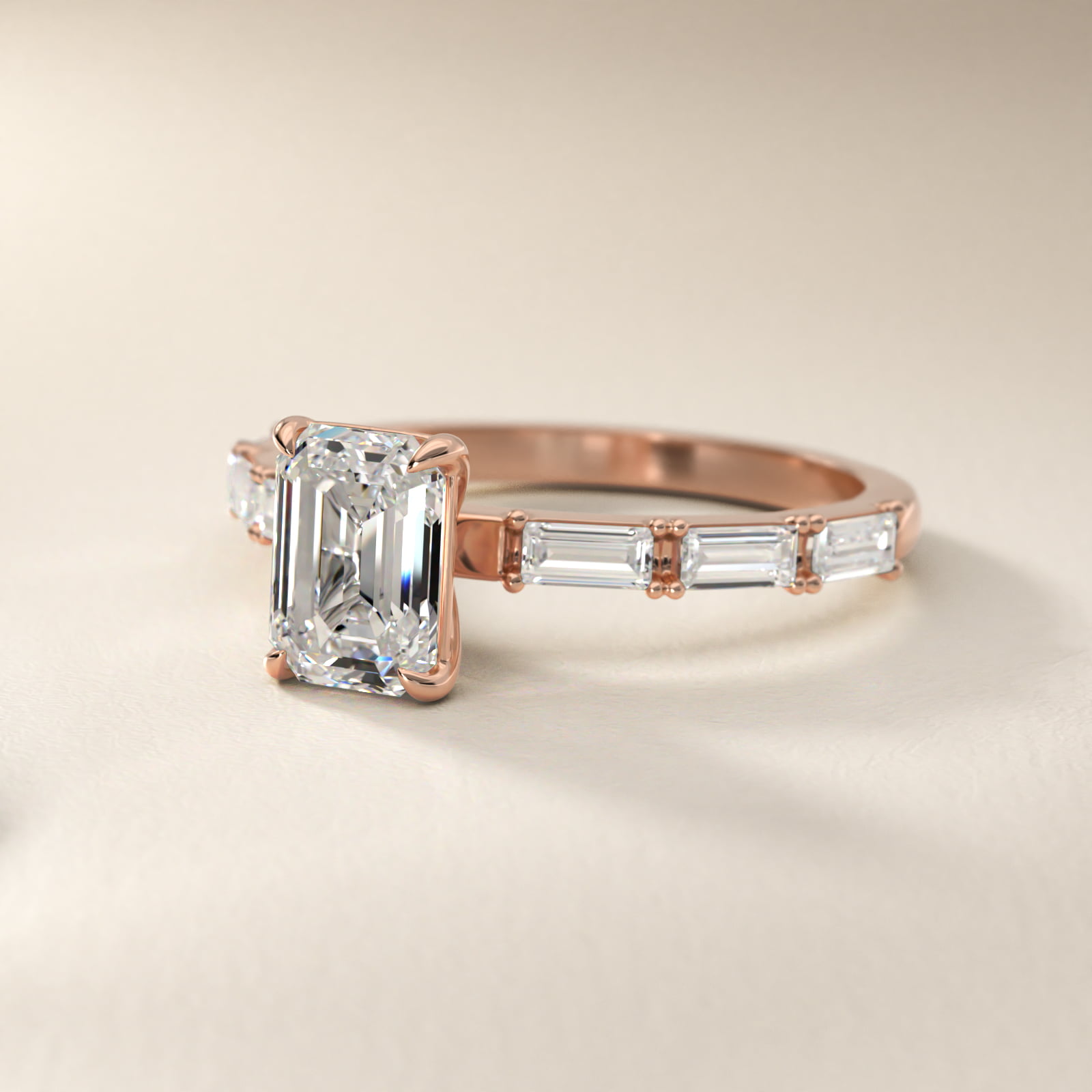 Emerald cut diamond engagement ring rose gold with edge halo detail