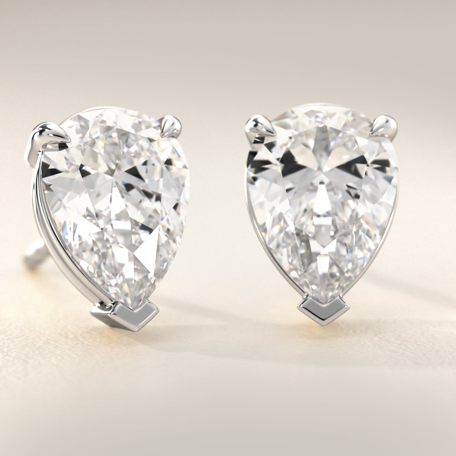 Pear Cut Diamond Stud Earrings    In 14K White Gold (Setting)