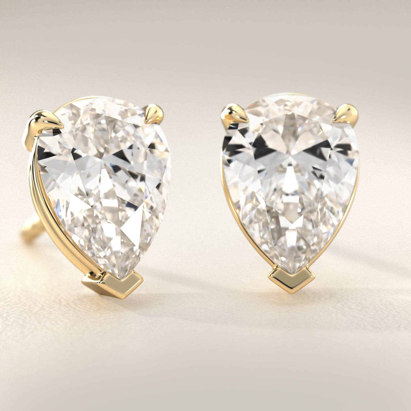 Pear Cut Diamond Stud Earrings    In 14K Yellow Gold (Setting)