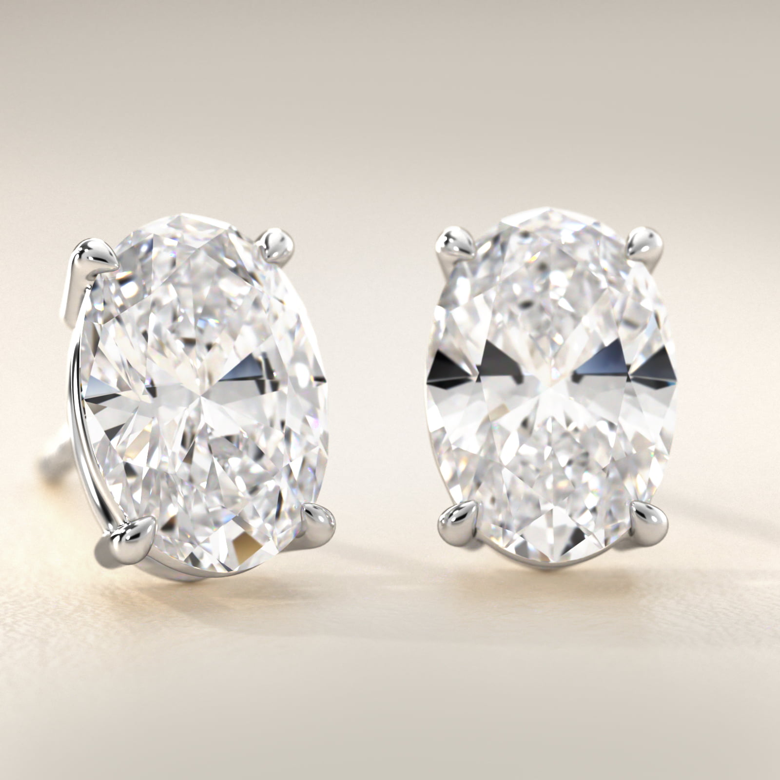 Oval Cut Diamond Stud Earrings    In 14K White Gold (Setting)