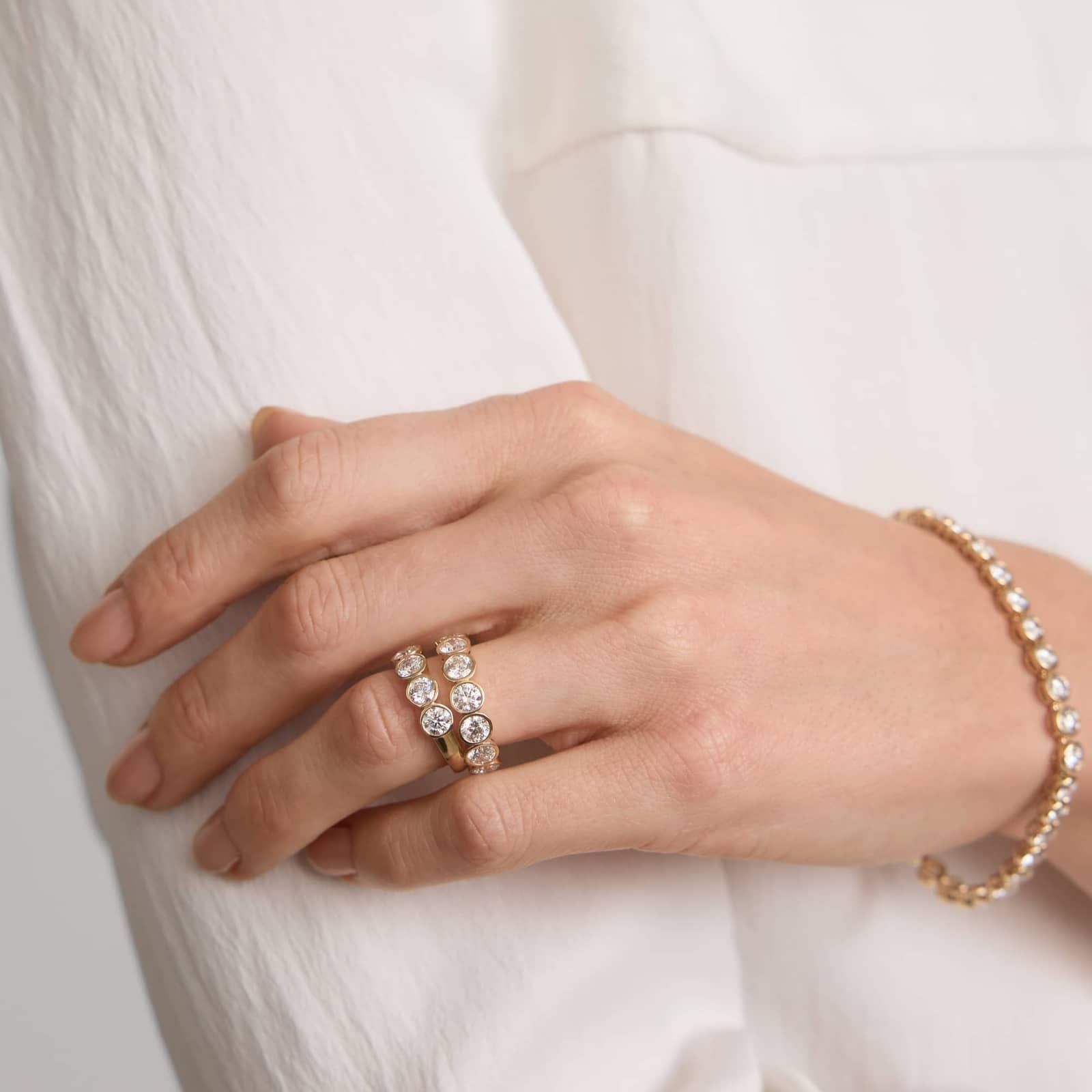 Seven Stone Bezel Anniversary Ring With 1.5 CTW Round Cut Diamonds in 14K Yellow Gold (4.65mm)