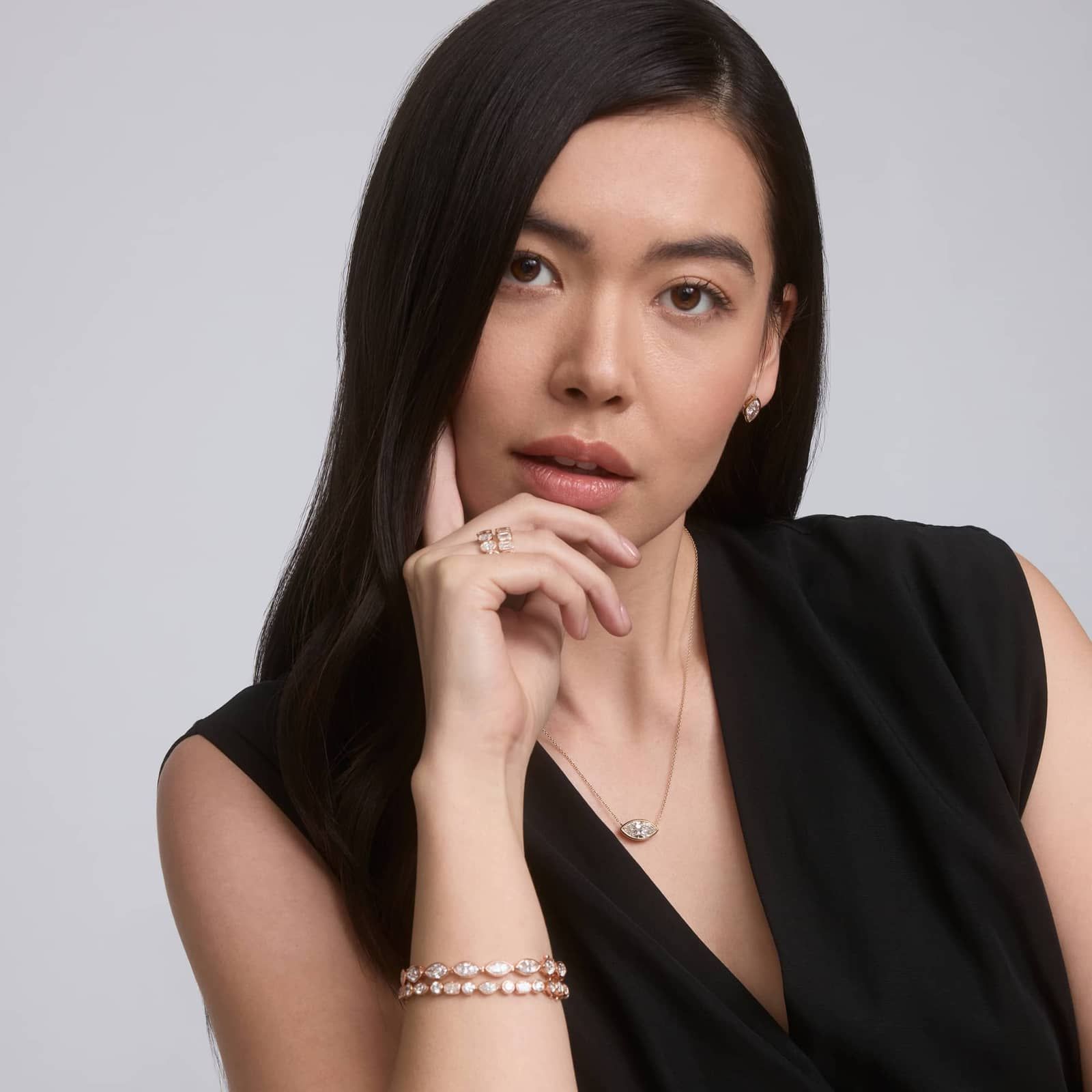 Seven Stone Bezel Anniversary Ring With 1.5 CTW Oval Cut Lab-Grown Diamonds in 14K Rose Gold (5mm)