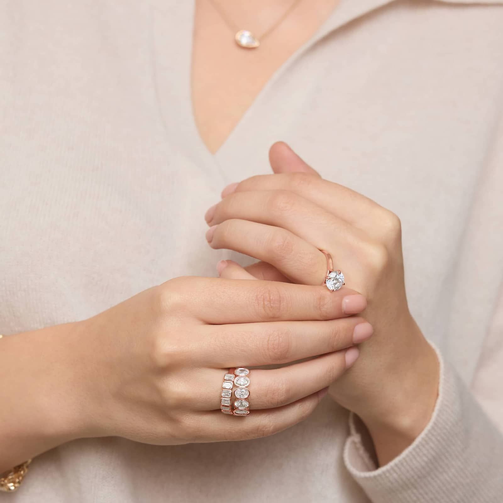 Seven Stone Bezel Anniversary Ring With 3 CTW Oval Cut Diamonds in 14K Rose Gold (6.7mm)