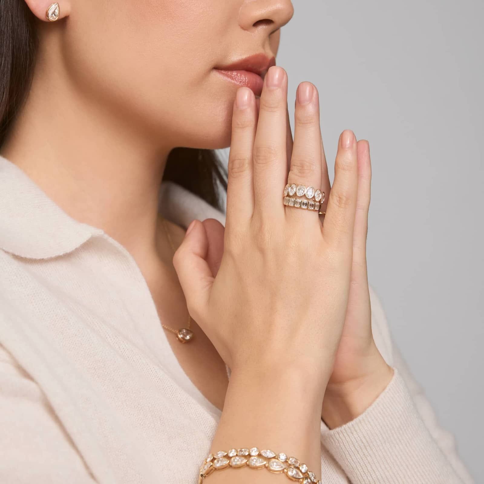 Seven Stone Bezel Anniversary Ring With 3 CTW Oval Cut Diamonds in 14K Yellow Gold (6.7mm)