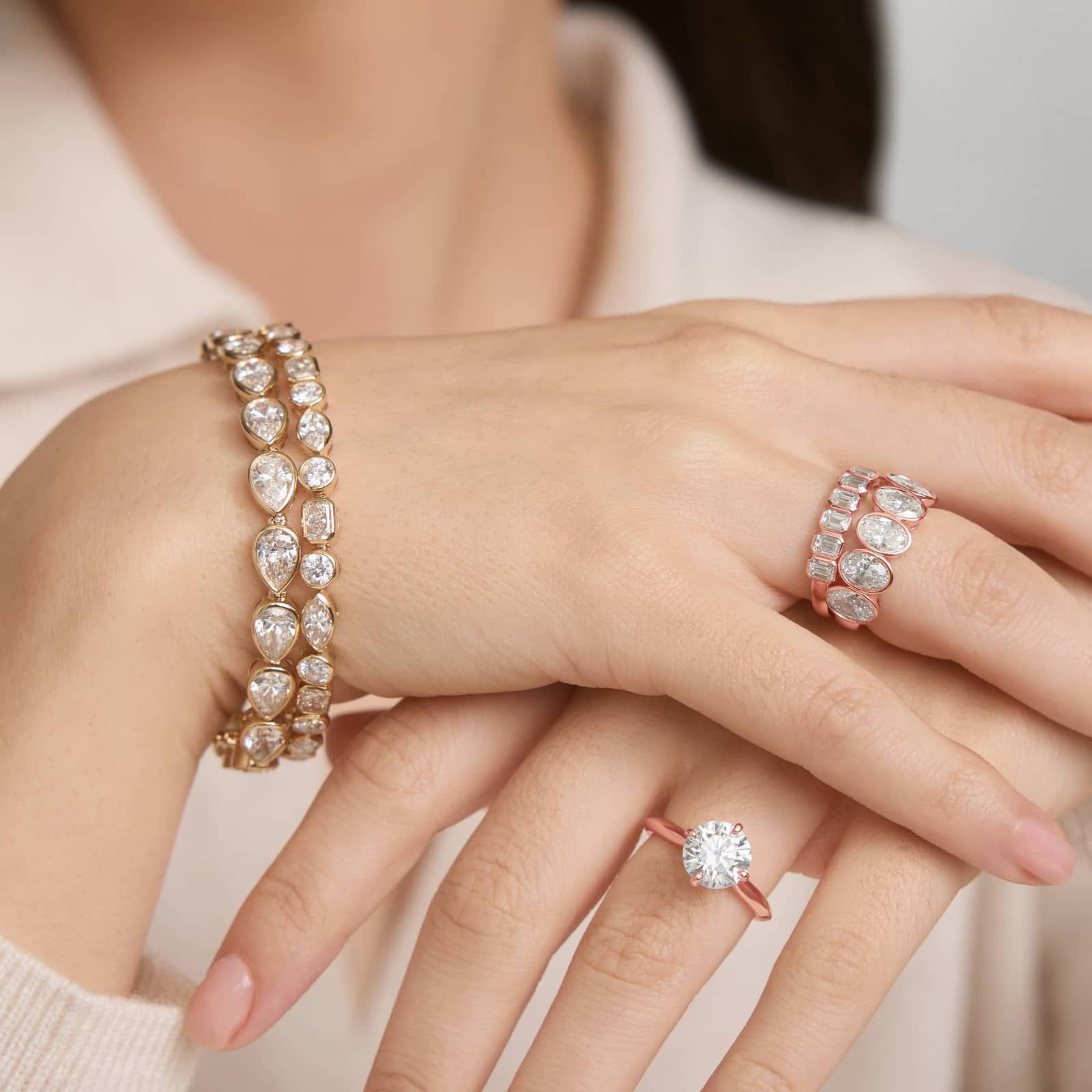 Seven Stone Bezel Anniversary Ring With 3.5 CTW Oval Cut Diamonds in 14K Rose Gold (7.4mm)