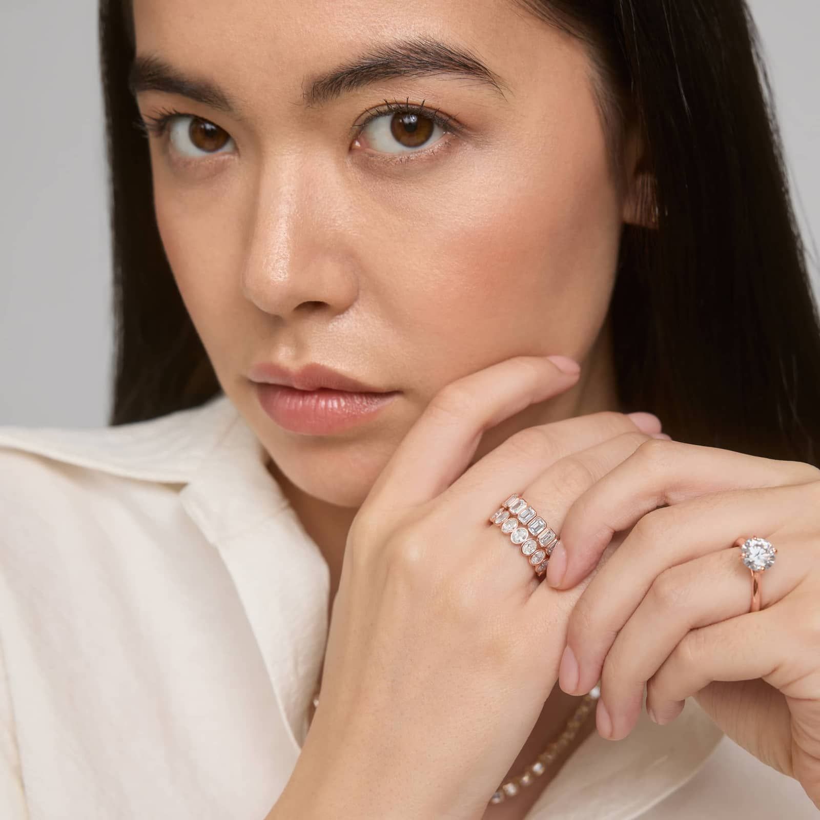 Bezel Eternity Ring With 3 CTW Oval Cut Diamonds in 14K Rose Gold (4.9mm)