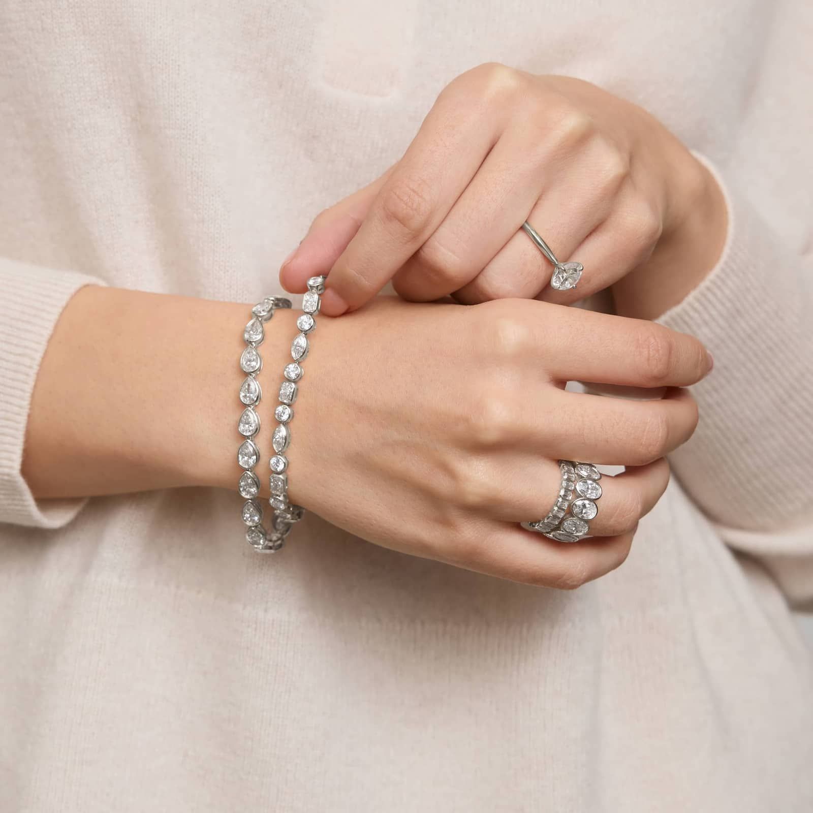 Bezel Eternity Ring With 8 CTW Oval Cut Diamonds in Platinum (8mm)