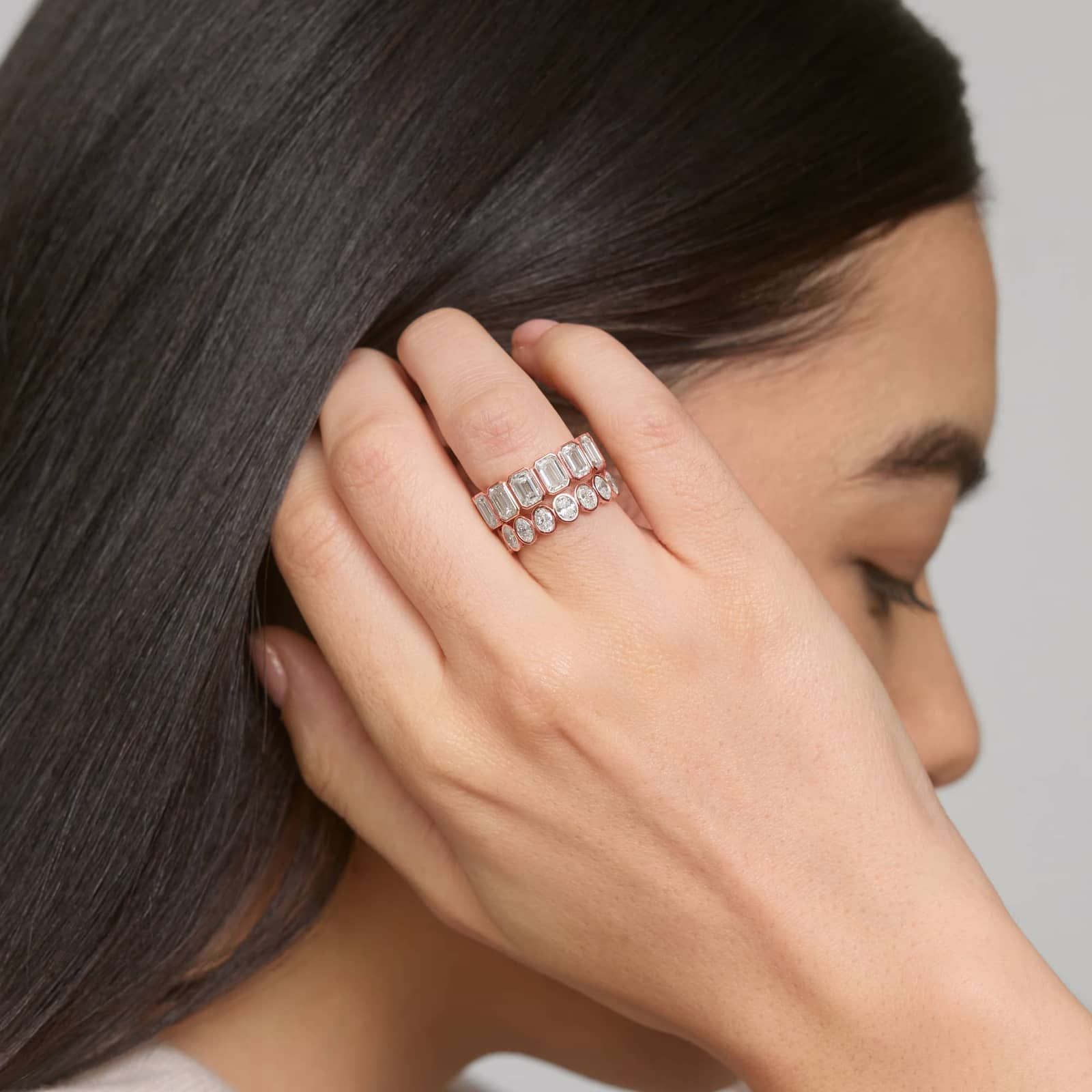 Bezel Eternity Ring With 7 CTW Emerald Cut Diamonds in 14K Rose Gold (6.3mm)