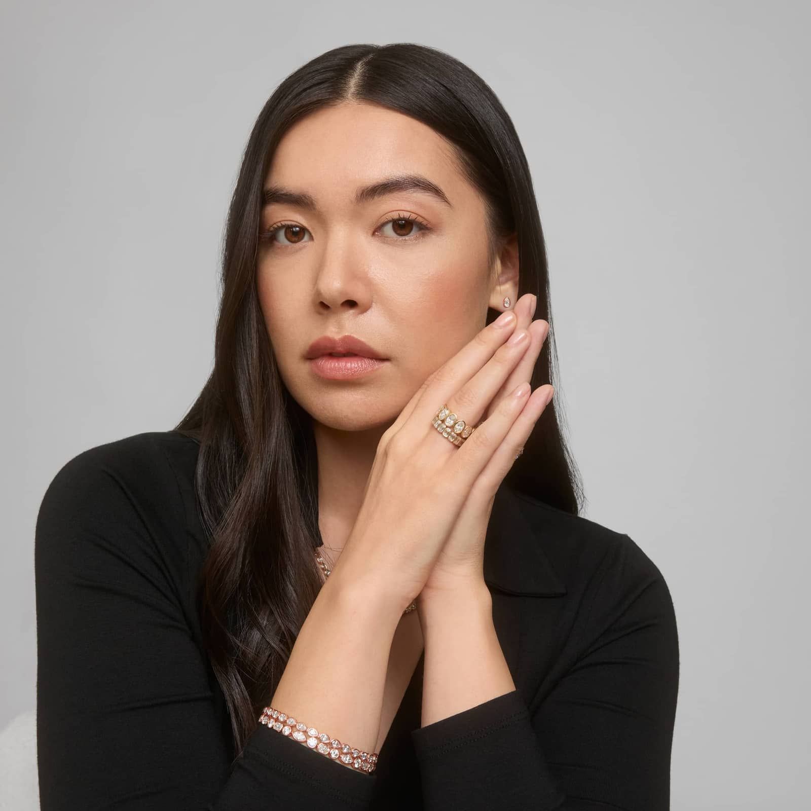 East-West Bezel Tennis Bracelet With 5 CTW Pear Shaped Diamonds in 14K Rose Gold