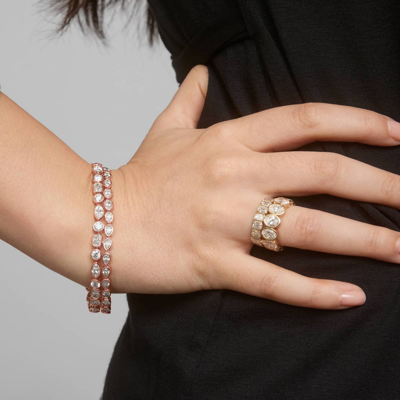 East-West Bezel Tennis Bracelet With 5 CTW Pear Shaped Diamonds in 14K Rose Gold