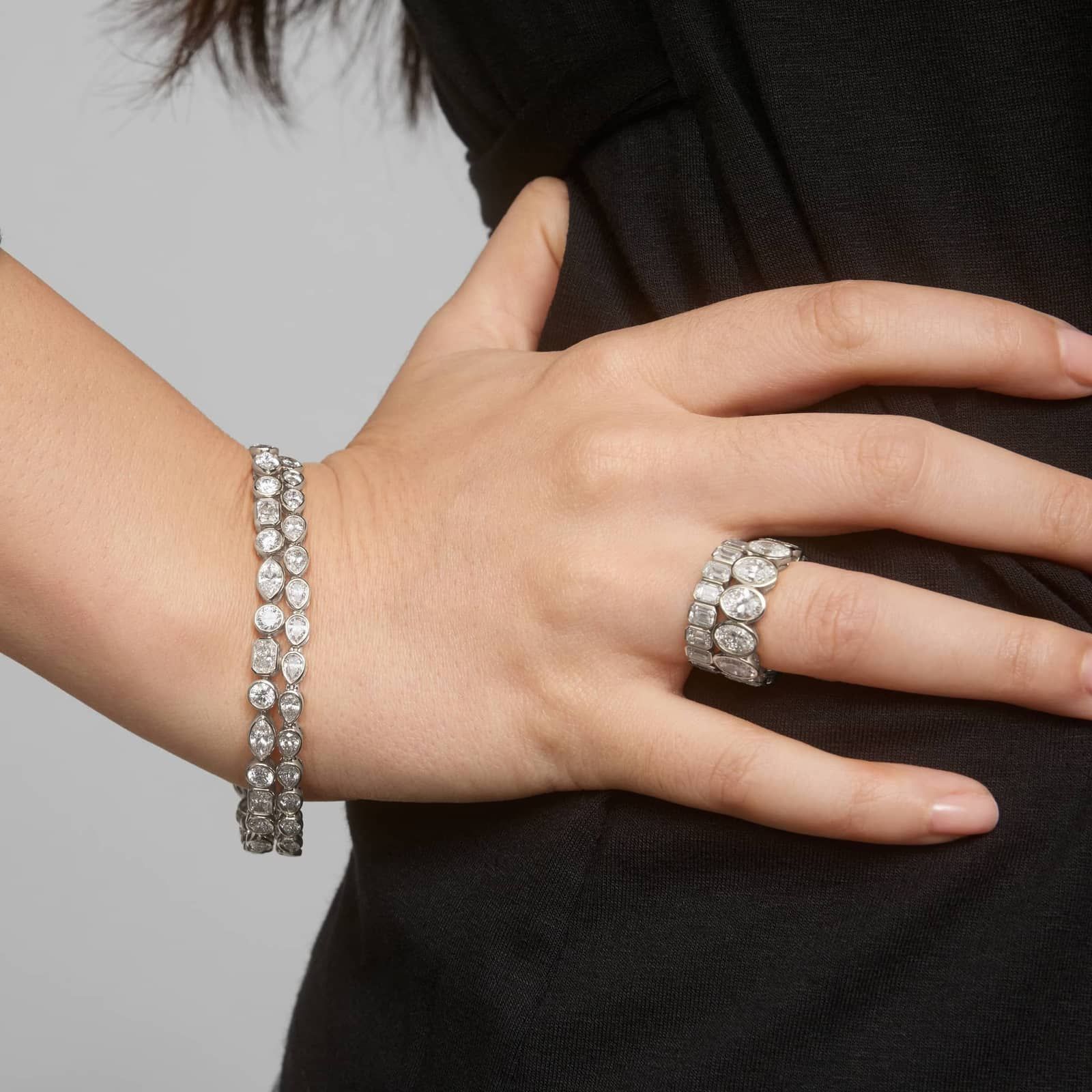 East-West Bezel Tennis Bracelet With 5 CTW Pear Shaped Diamonds in 14K White Gold
