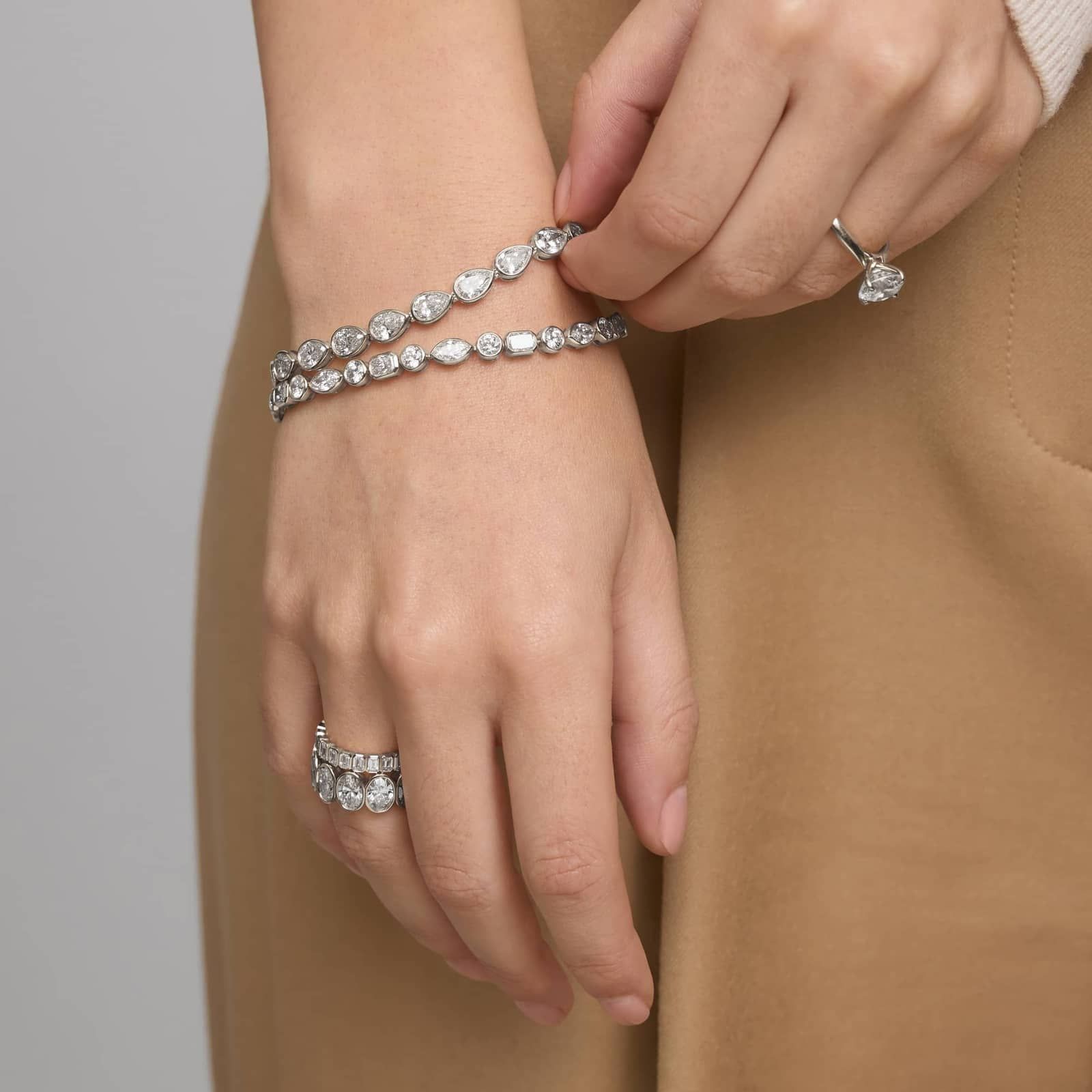 East-West Bezel Tennis Bracelet With 12 CTW Pear Shaped Lab-Grown Diamonds in 14K White Gold
