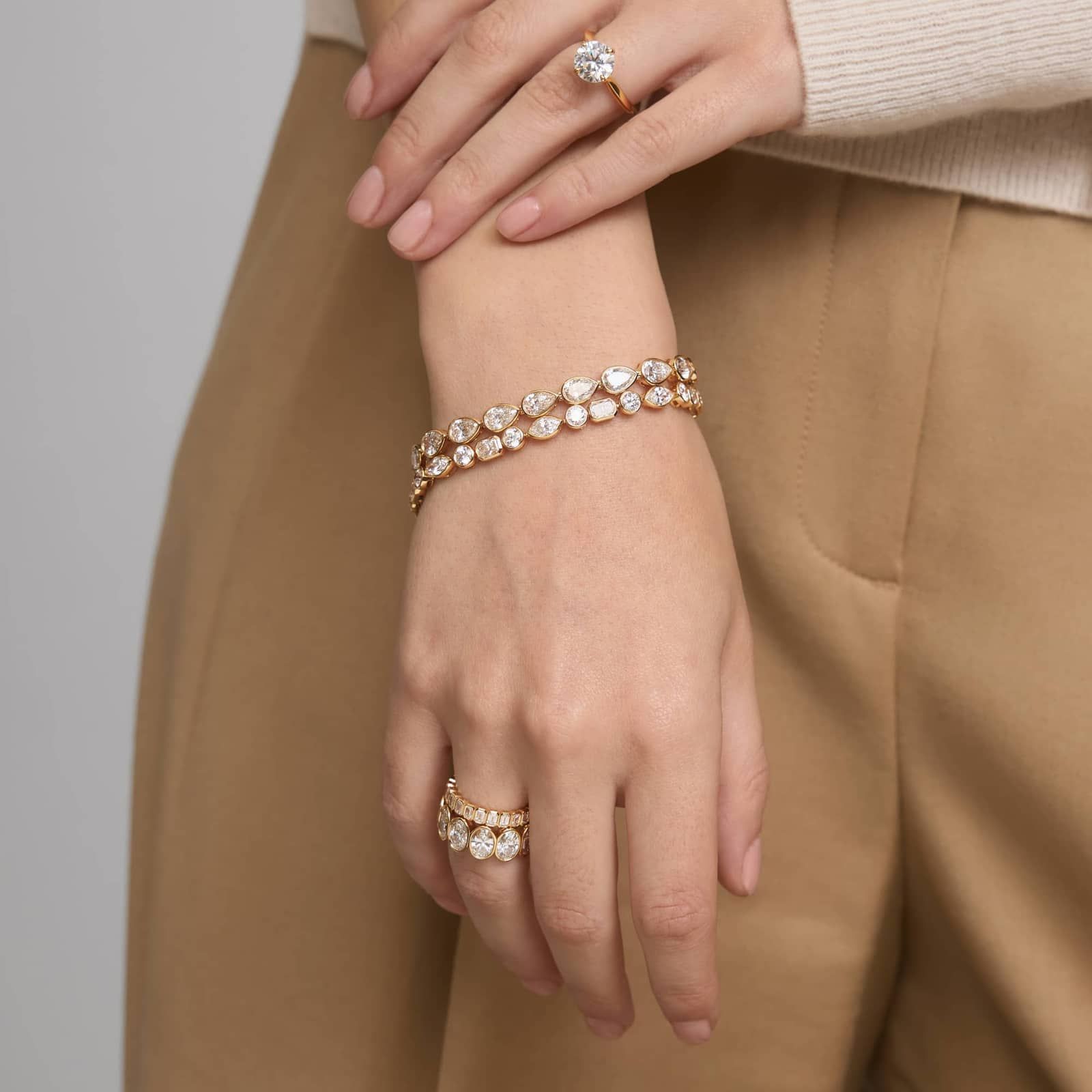 East-West Bezel Tennis Bracelet With 12 CTW Pear Shaped Lab-Grown Diamonds in 14K Yellow Gold