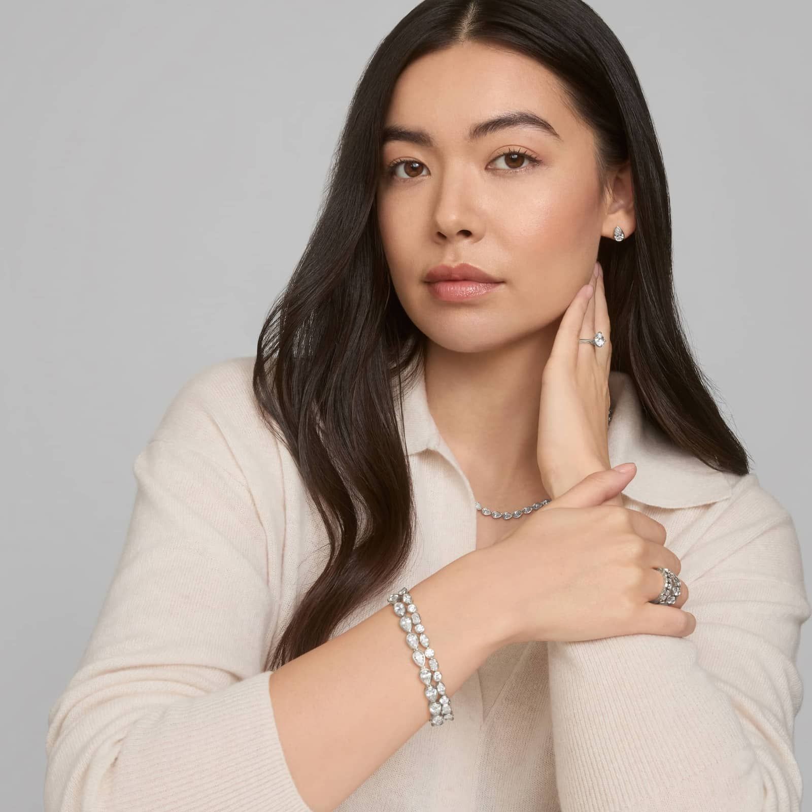 East-West Bezel Tennis Bracelet With 15 CTW Pear Shaped Lab-Grown Diamonds in 14K White Gold