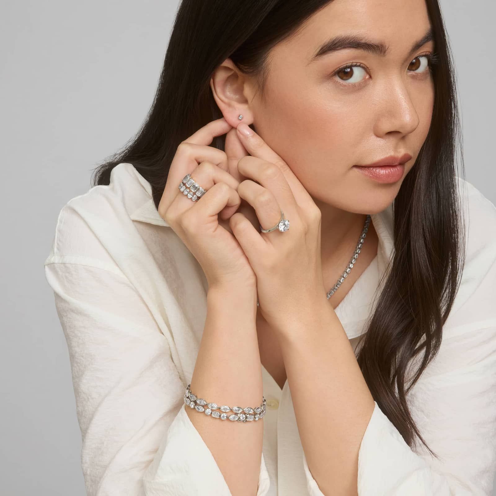 Bezel Set Emerald Cut Diamond Stud Earrings In 14K White Gold (1/4 Ct. tw. - H-I / SI1-SI2)