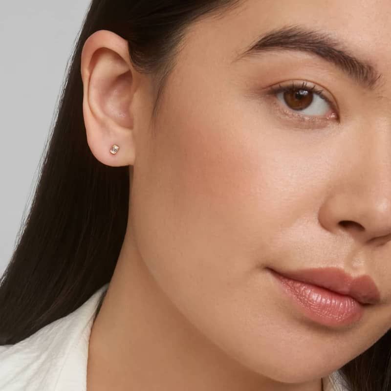 Bezel Set Emerald Cut Lab-Grown Diamond Stud Earrings In 14K Yellow Gold (1/4 Ct. tw. - F-G / VS2-SI1)