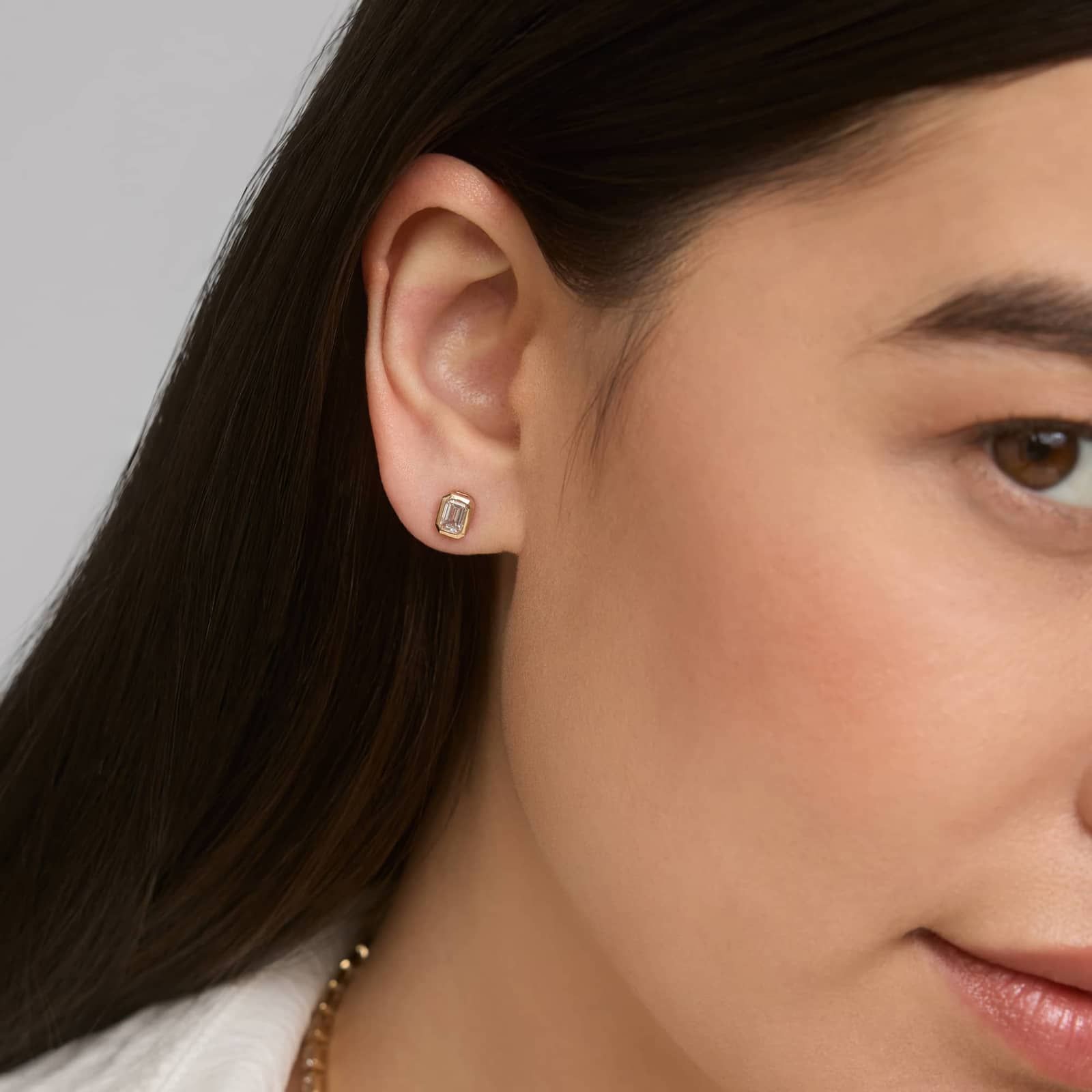 Bezel Set Emerald Cut Diamond Stud Earrings In 14K Yellow Gold (1 Ct. tw. - H-I / SI1-SI2)