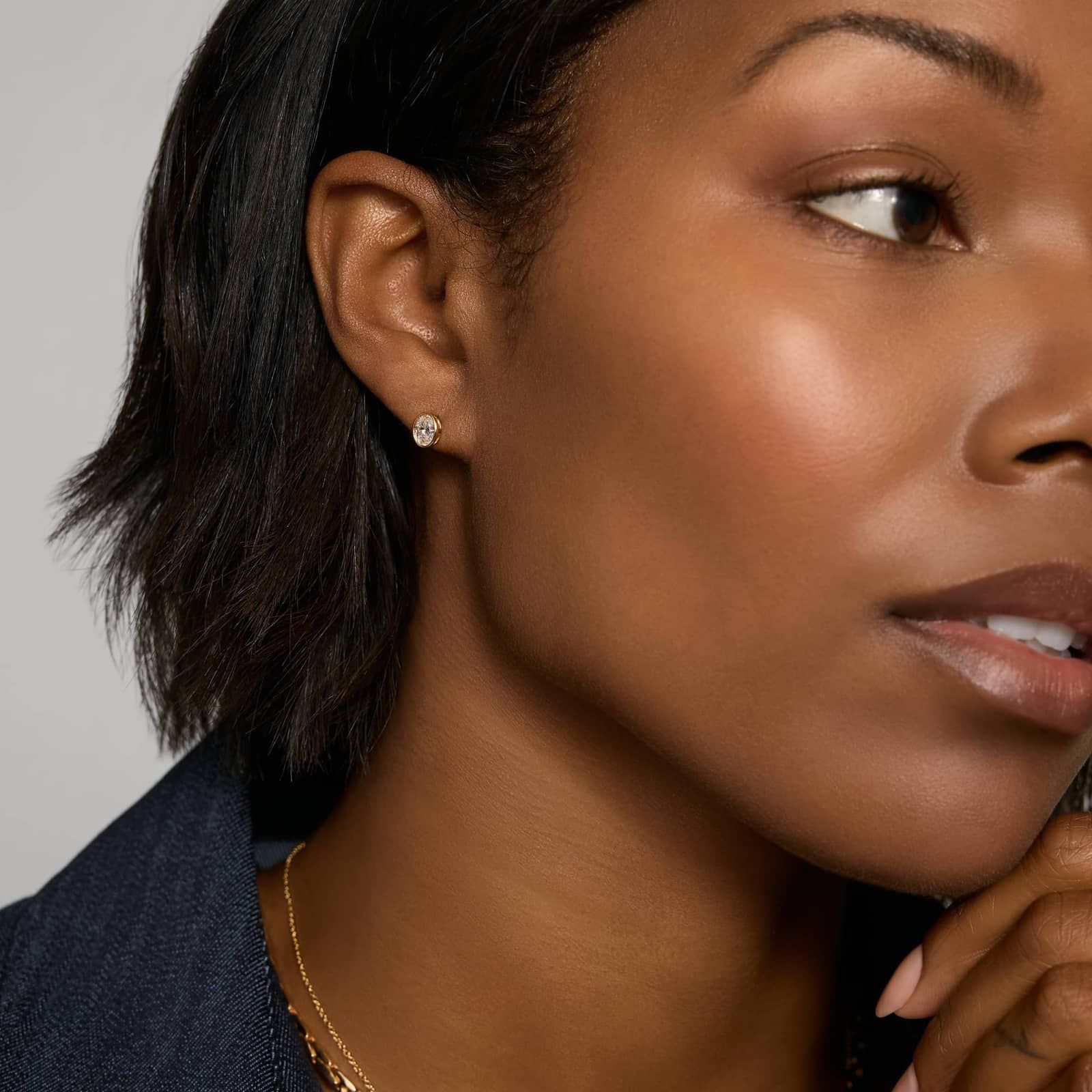 Bezel Stud Earrings With 0.75 CTW Oval Cut Lab-Grown Diamonds in 14K Yellow Gold