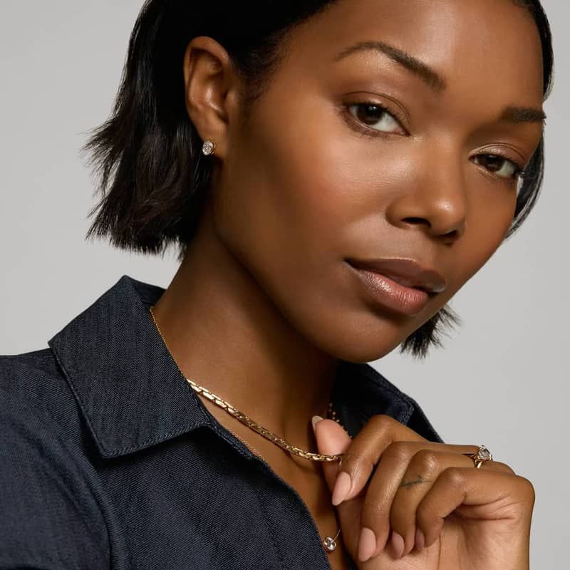 Bezel Diamond Stud Earrings With 1.5 CTW Oval Cut Diamonds in 14K Yellow Gold