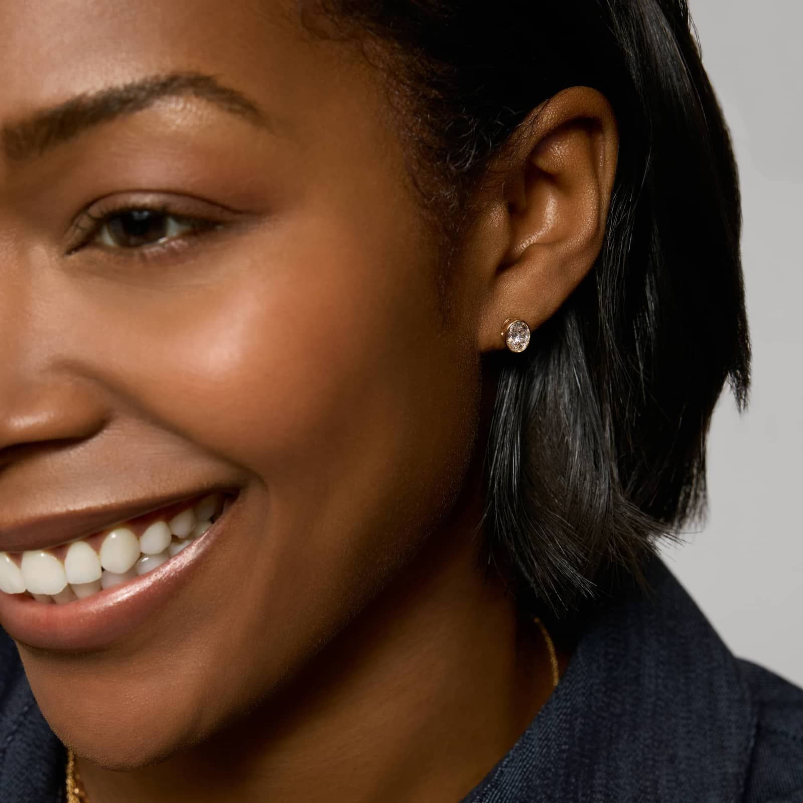 Bezel Stud Earrings With 1.5 CTW Oval Cut Lab-Grown Diamonds in 14K Yellow Gold