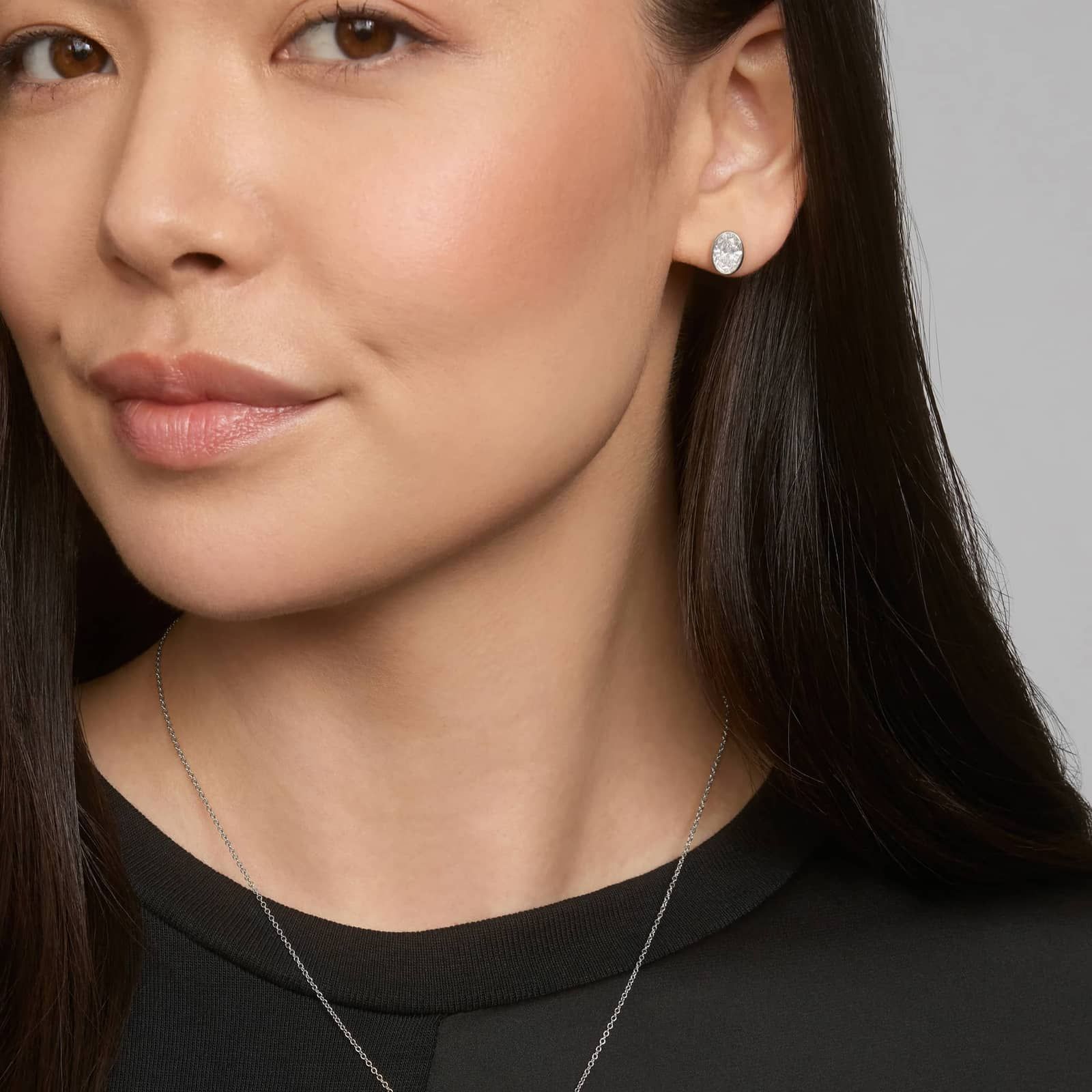 Bezel Stud Earrings With 2 CTW Oval Cut Lab-Grown Diamonds in 14K White Gold