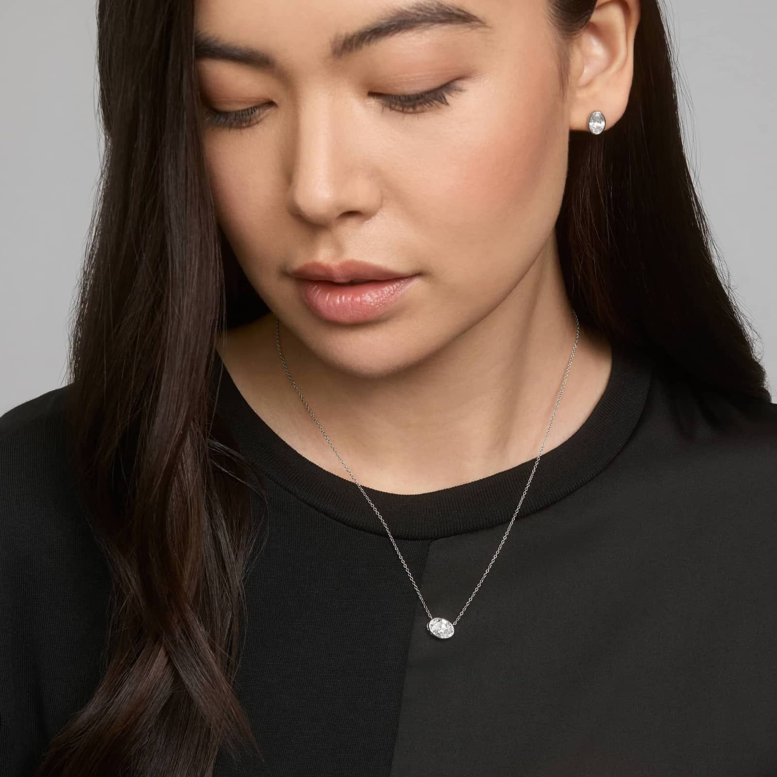 Bezel Stud Earrings With 2 CTW Oval Cut Lab-Grown Diamonds in 14K White Gold