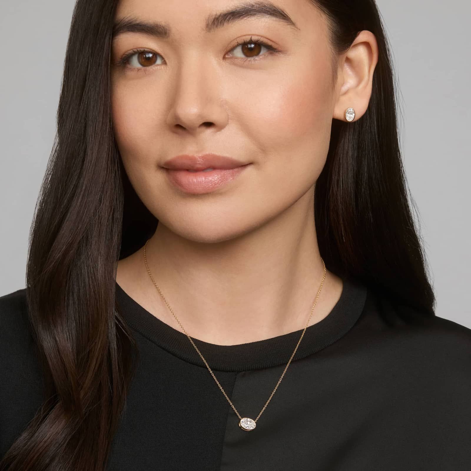 Bezel Stud Earrings With 2 CTW Oval Cut Lab-Grown Diamonds in 14K Yellow Gold