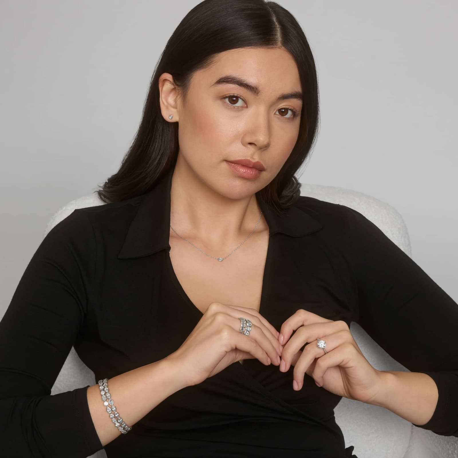 Bezel Diamond Stud Earrings With 0.25 CTW Pear Shaped Diamonds in Platinum