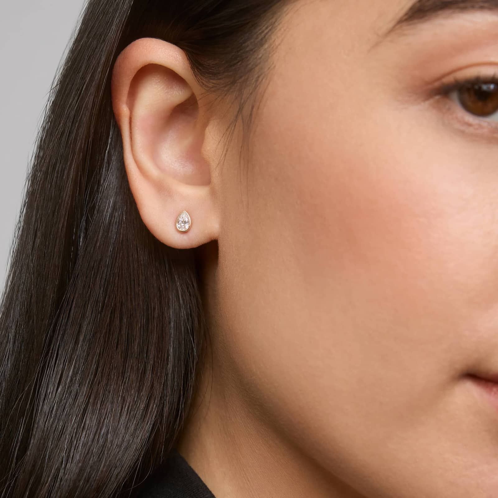 Bezel Diamond Stud Earrings With 0.5 CTW Pear Shaped Diamonds in 14K Yellow Gold