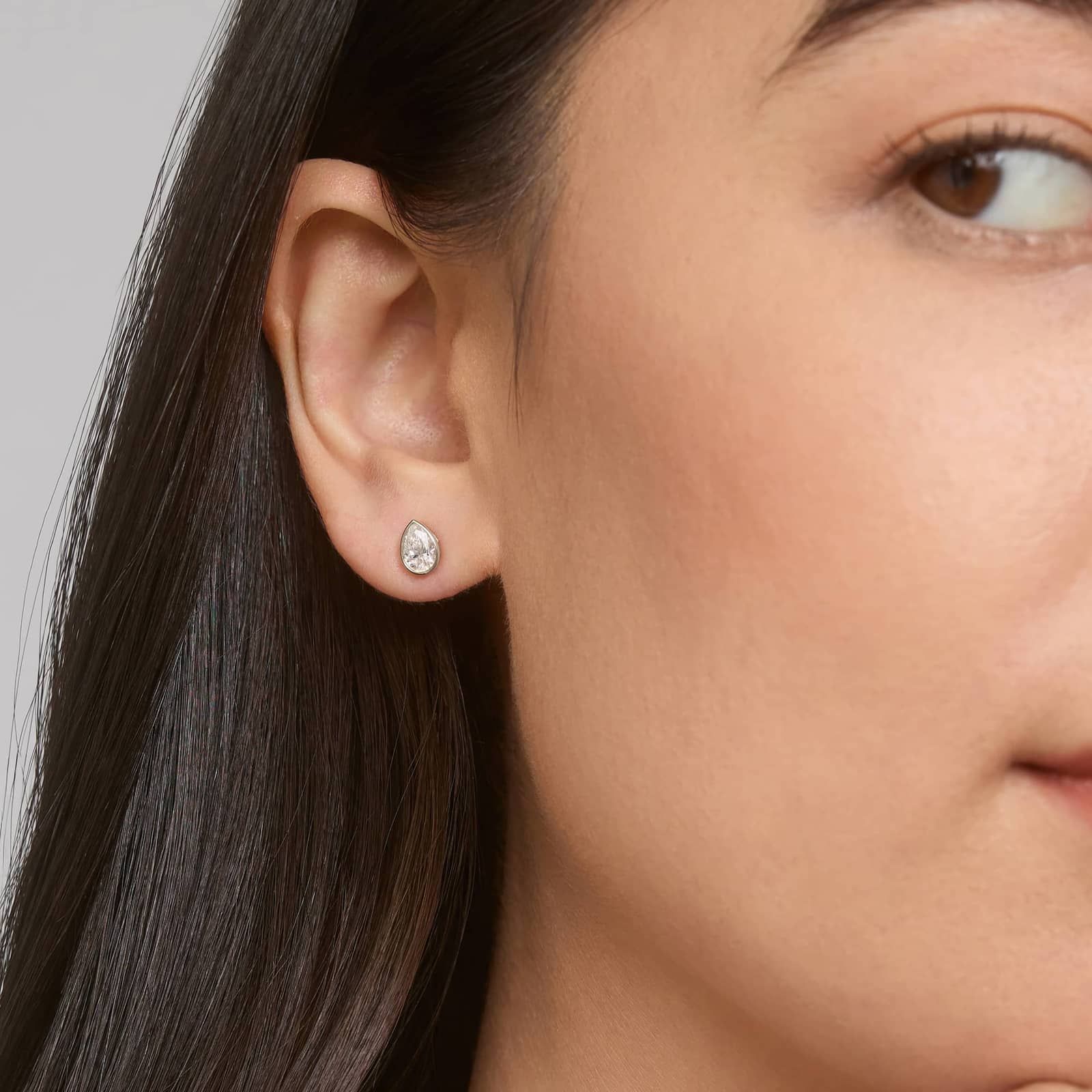 Bezel Diamond Stud Earrings With 0.75 CTW Pear Shaped Diamonds in 14K White Gold