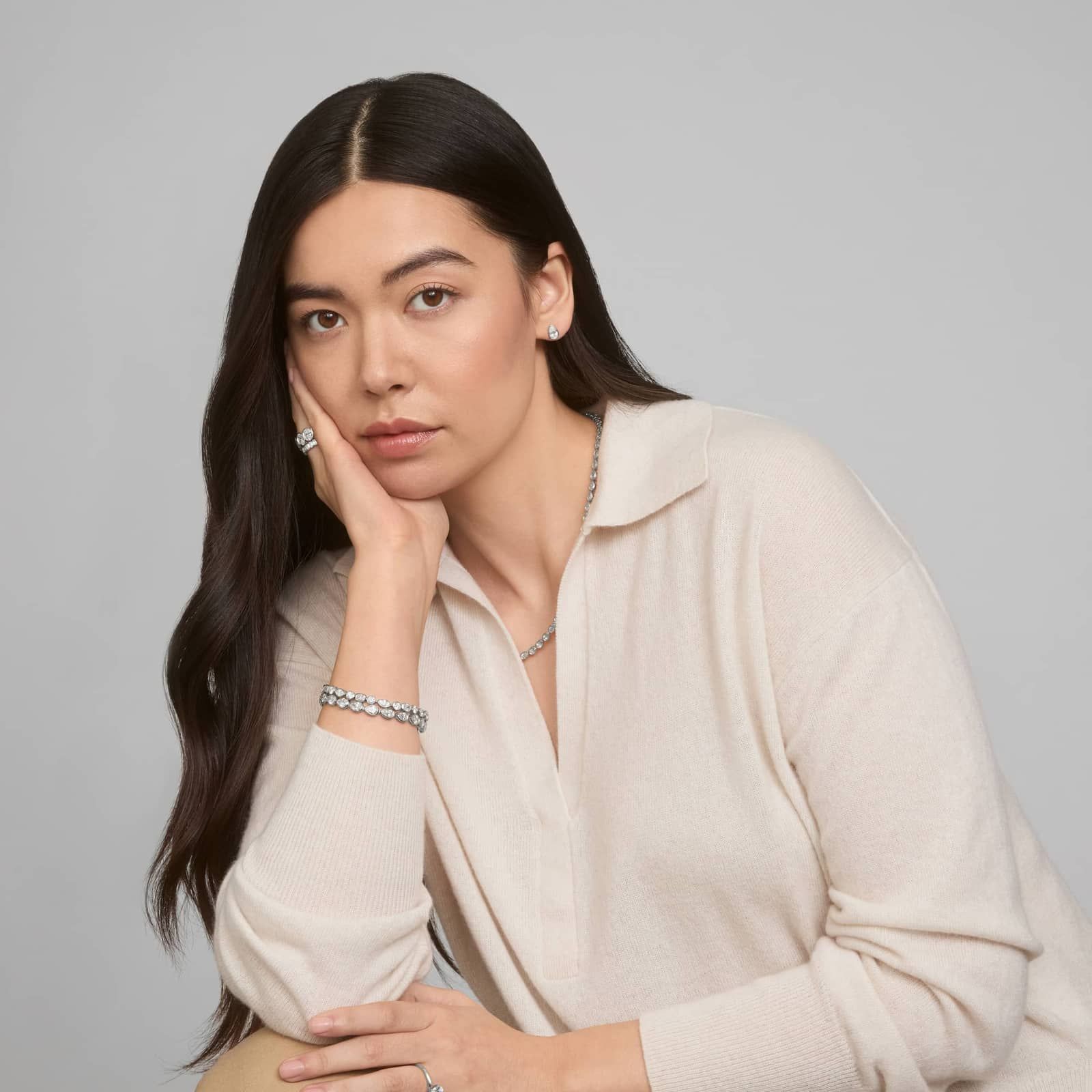 Bezel Diamond Stud Earrings With 1.5 CTW Pear Shaped Diamonds in Platinum