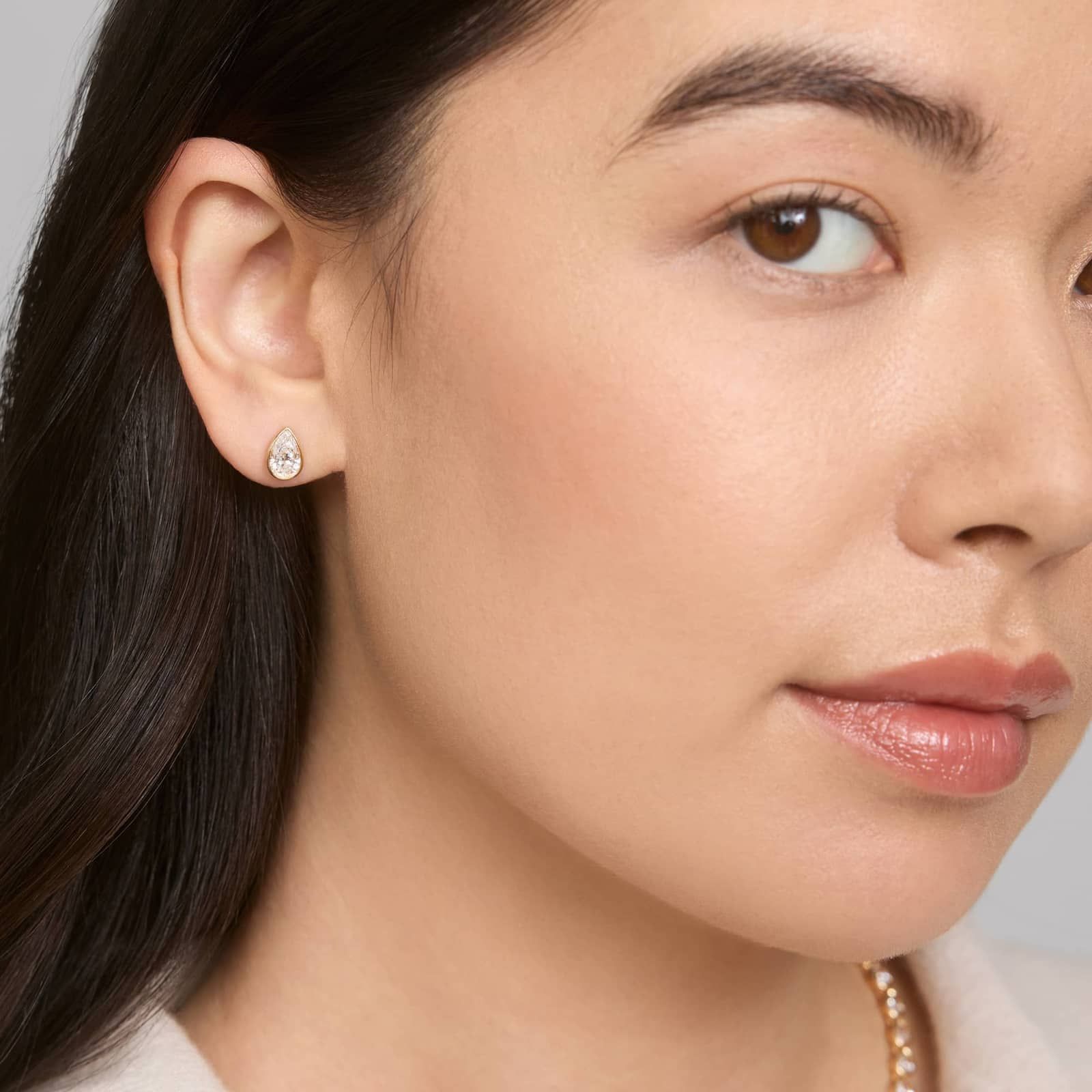 Bezel Diamond Stud Earrings With 1.5 CTW Pear Shaped Diamonds in 14K Yellow Gold