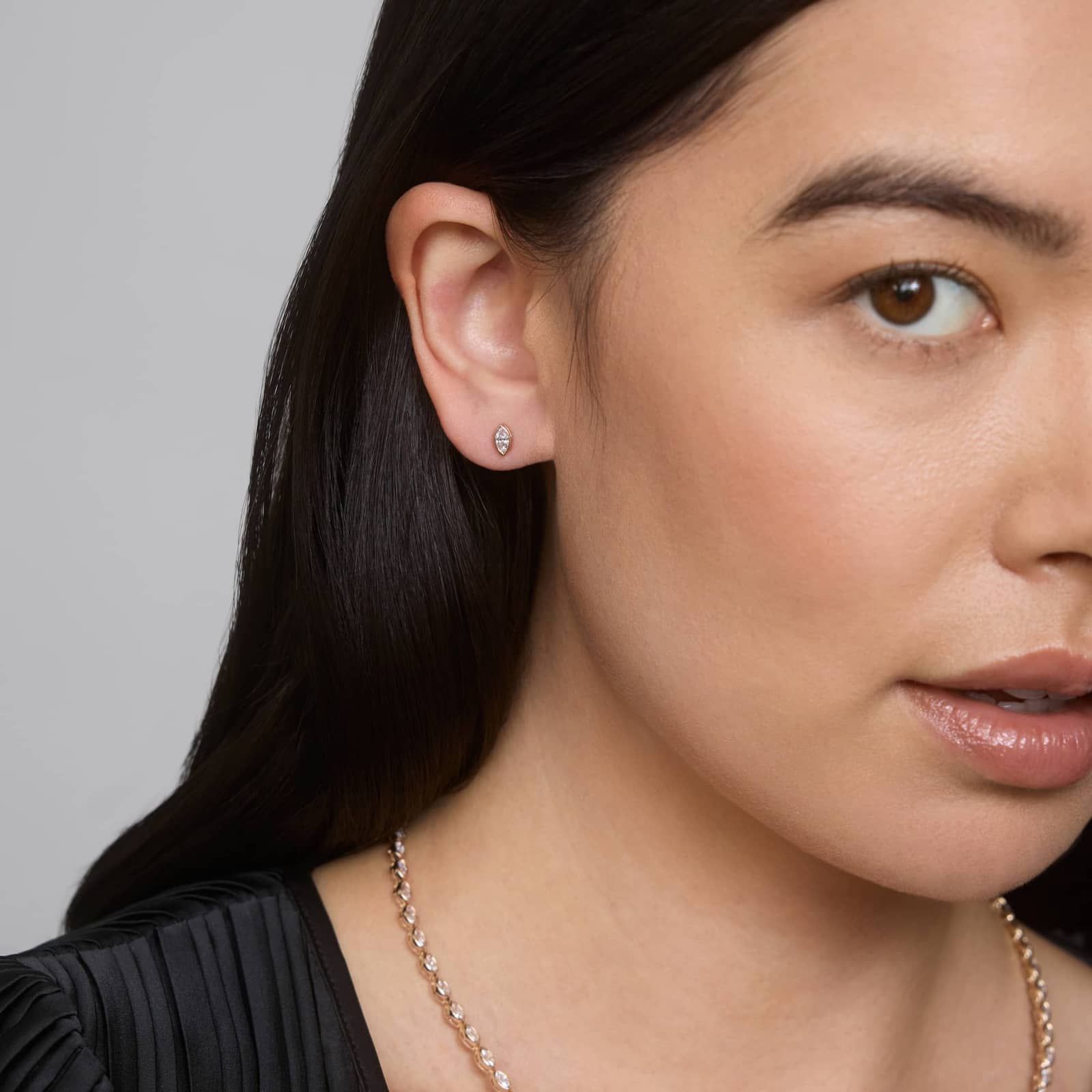 Bezel Diamond Stud Earrings With 0.25 CTW Marquise Cut Diamonds in 14K Yellow Gold