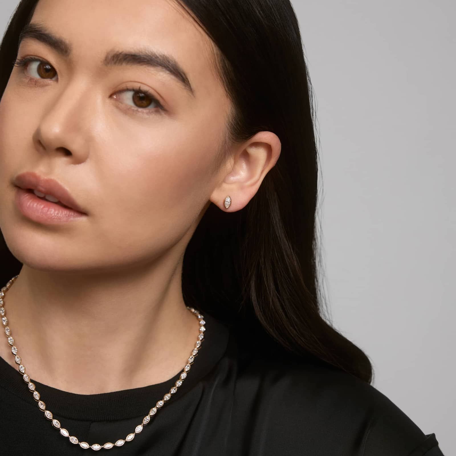 Bezel Diamond Stud Earrings With 0.75 CTW Marquise Cut Diamonds in 14K Yellow Gold