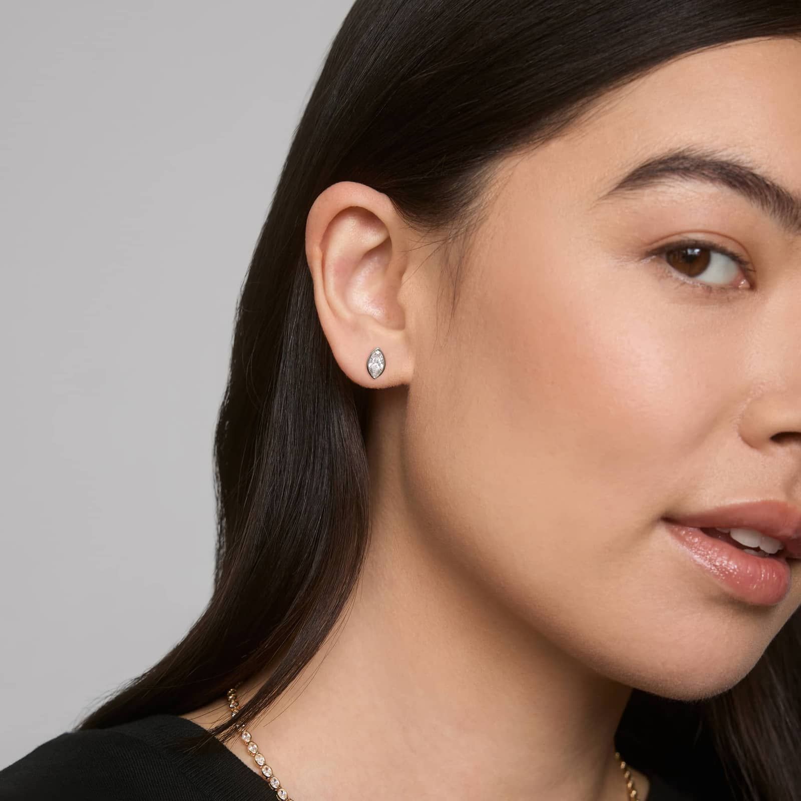 Bezel Diamond Stud Earrings With 1.5 CTW Marquise Cut Diamonds in Platinum