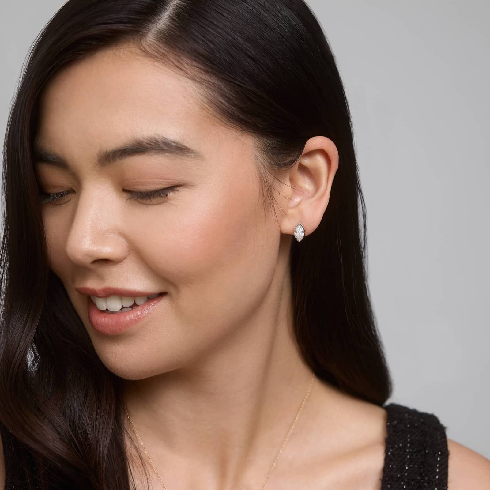 Bezel Diamond Stud Earrings With 2 CTW Marquise Cut Diamonds in Platinum