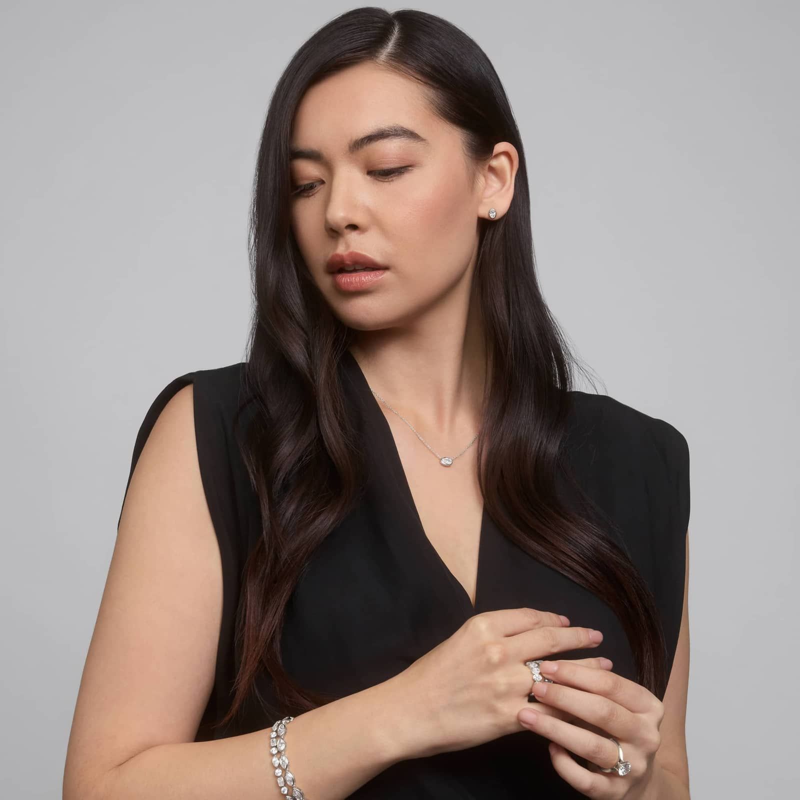 East-West Bezel Solitaire Pendant Necklace With 1 CTW Oval Cut Diamond in 14K White Gold