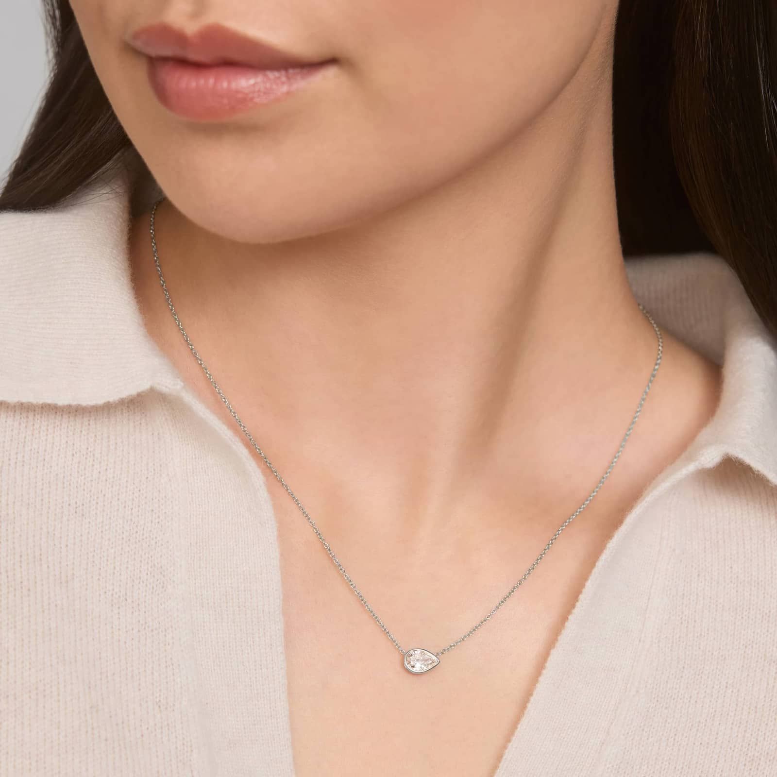 East-West Bezel Solitaire Pendant Necklace With 0.75 CTW Pear Shaped Lab-Grown Diamond in 14K White Gold