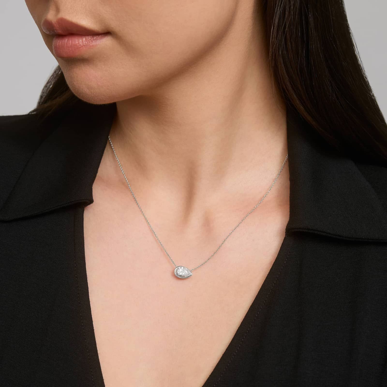 East-West Bezel Solitaire Pendant Necklace With 1.5 CTW Pear Shaped Lab-Grown Diamond in 14K White Gold