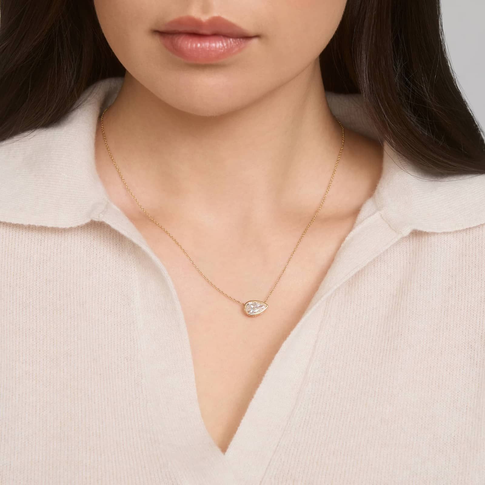 East-West Bezel Solitaire Pendant Necklace With 2 CTW Pear Shaped Lab-Grown Diamond in 14K Yellow Gold