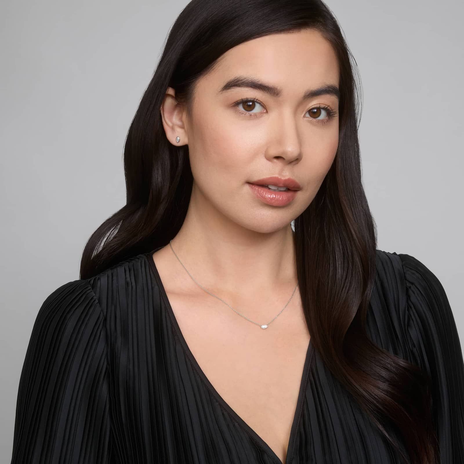 East-West Bezel Solitaire Pendant Necklace With 0.25 CTW Marquise Cut Diamonds in Platinum