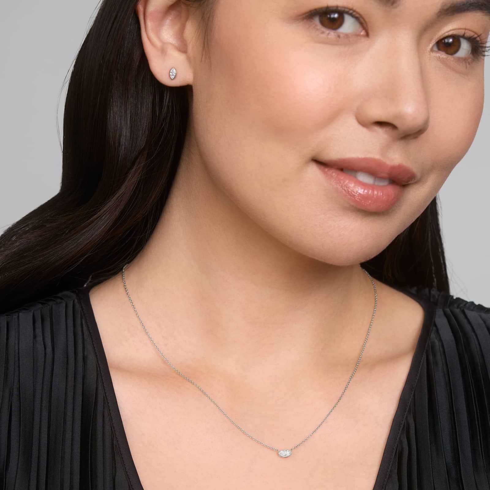 East-West Bezel Solitaire Pendant Necklace With 0.25 CTW Marquise Cut Diamonds in Platinum