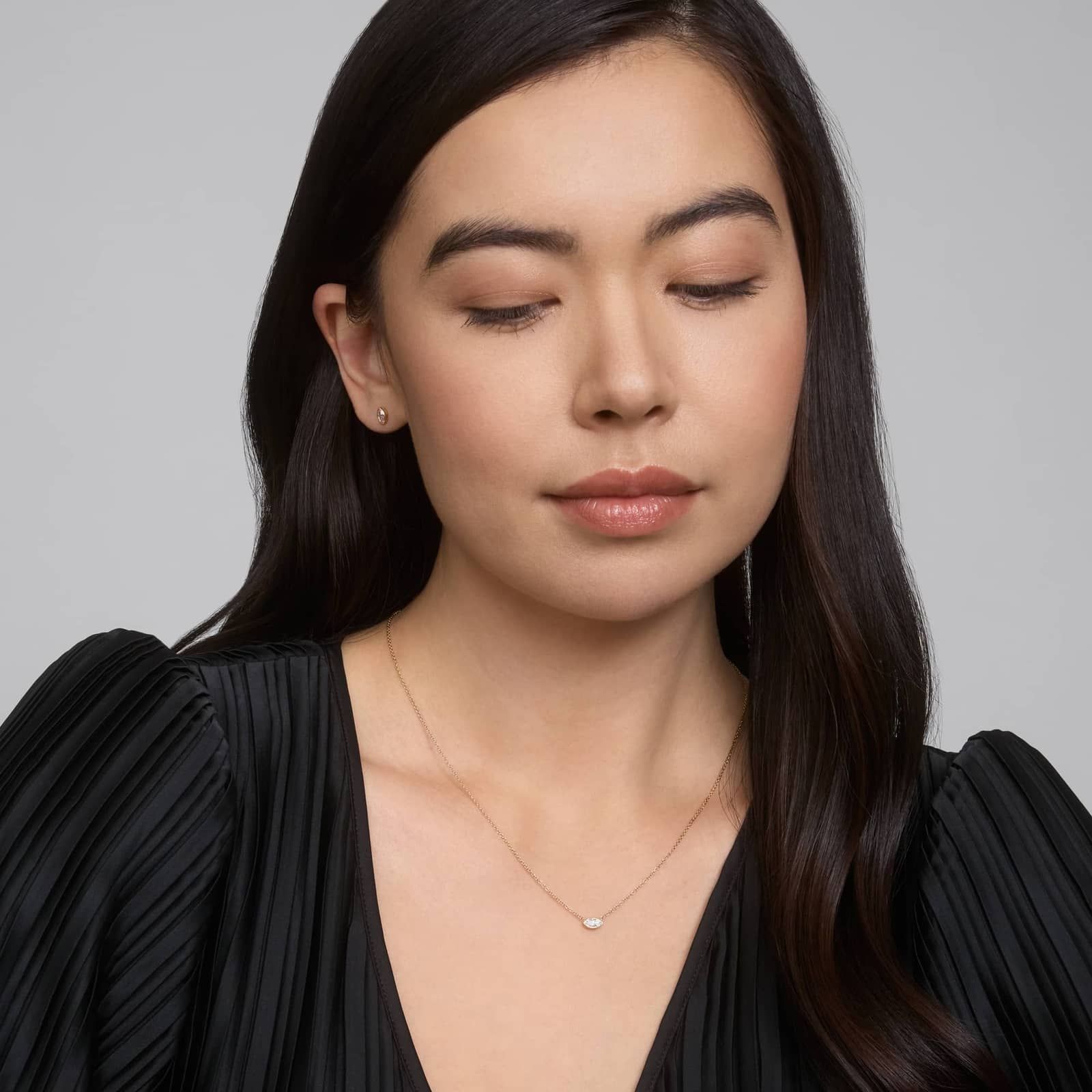 East-West Bezel Solitaire Pendant Necklace With 0.25 CTW Marquise Cut Diamonds in 14K Yellow Gold