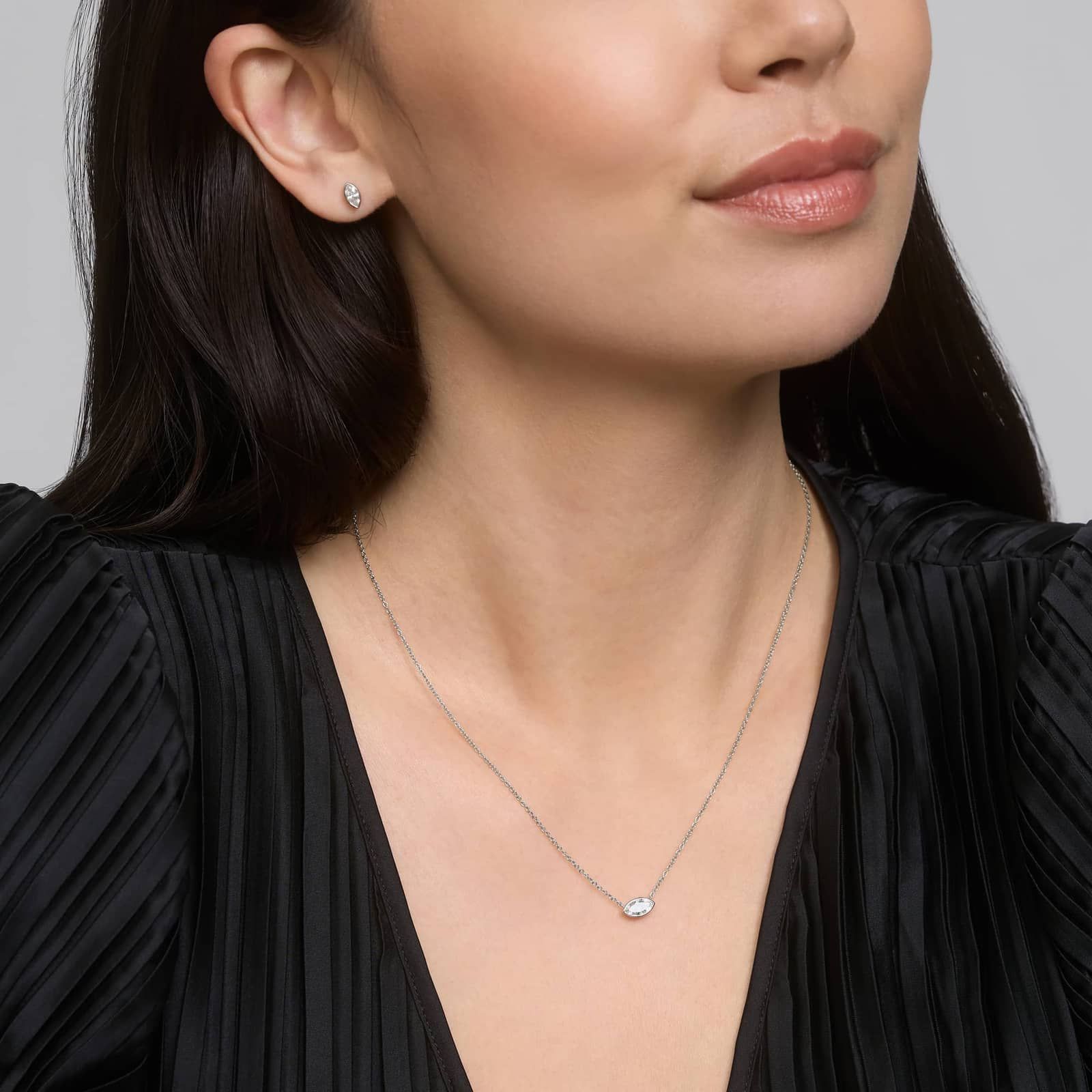 East-West Bezel Solitaire Pendant Necklace With 0.5 CTW Marquise Cut Diamonds in Platinum