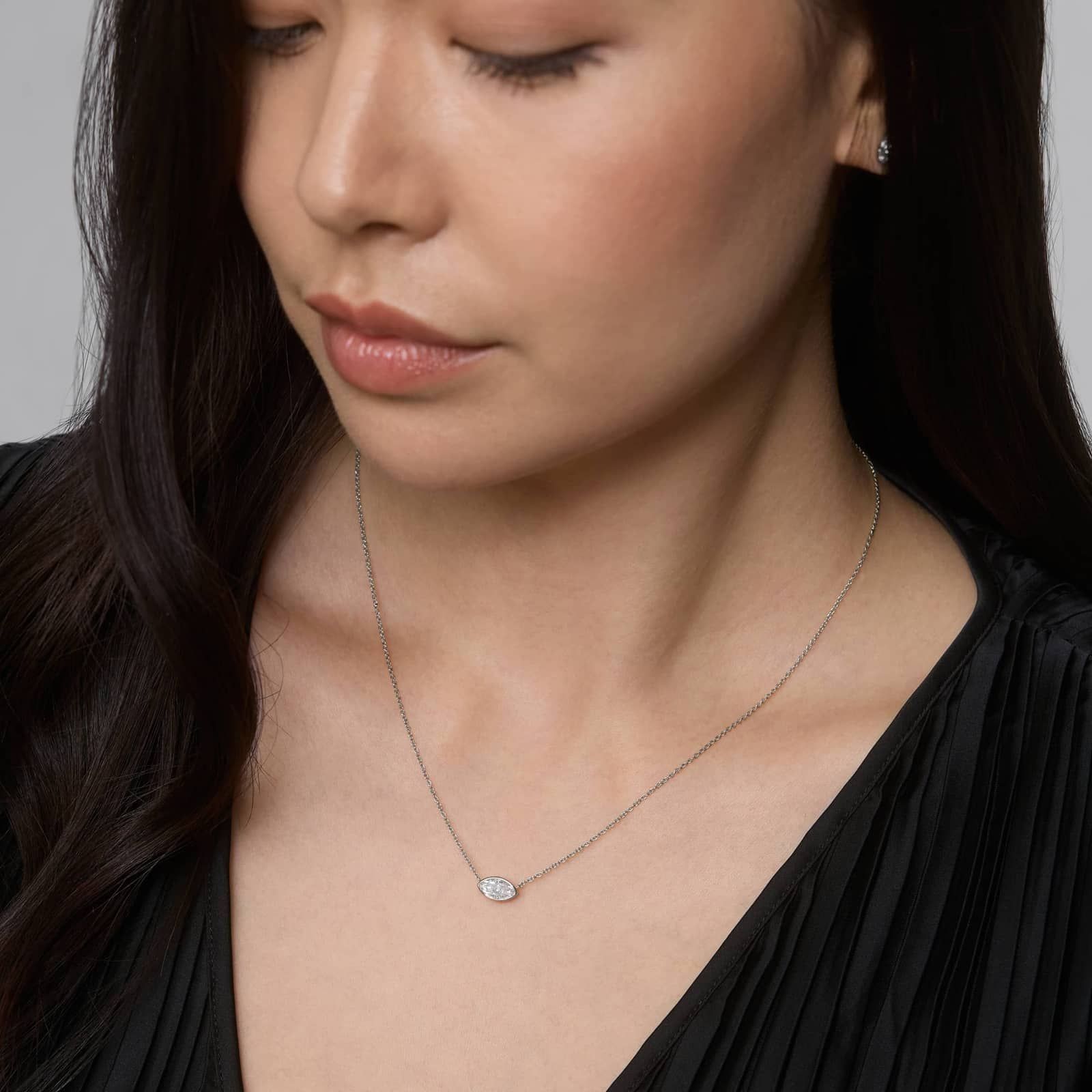 East-West Bezel Solitaire Pendant Necklace With 0.75 CTW Marquise Cut Diamonds in Platinum