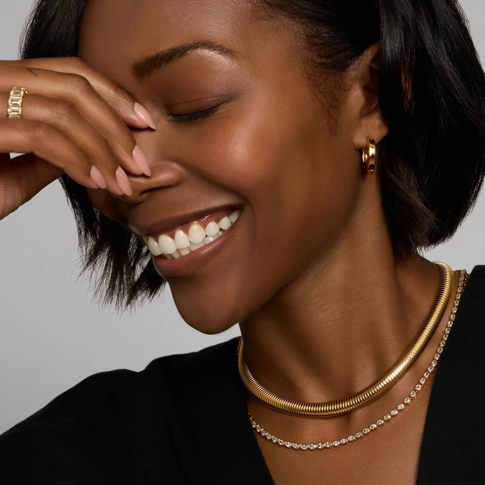 East-West Bezel Tennis Necklace With 10 CTW Oval Cut Diamonds in 14K Yellow Gold