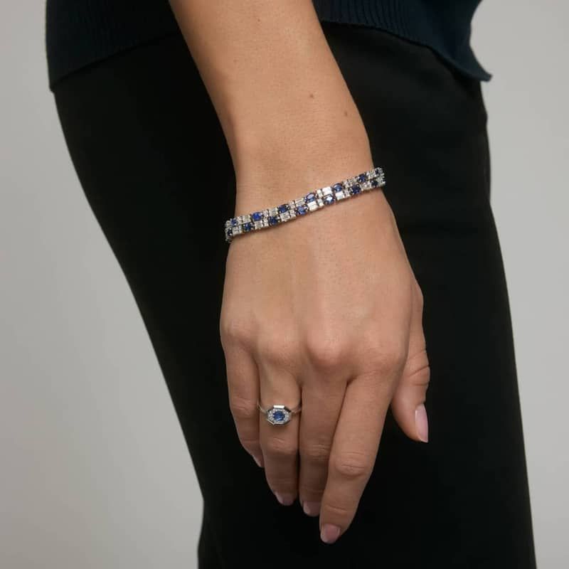 Alternating Baguette Cut Blue Sapphire And Diamond Tennis Bracelet In 14K White Gold